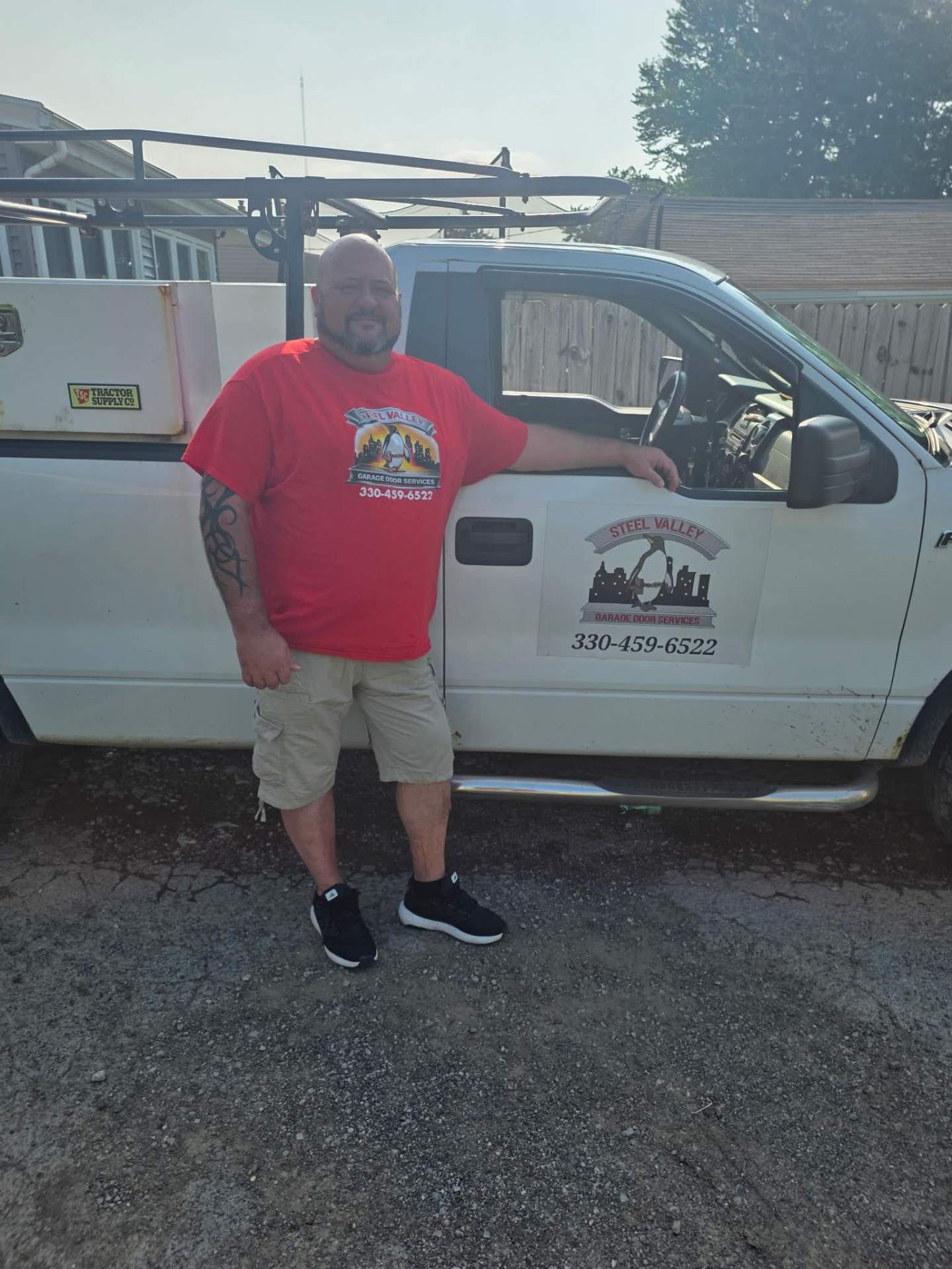 Steel Valley Garage Door Service technician with company truck